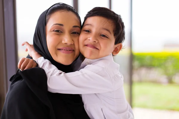 Boy hugging mother — Stock Photo, Image