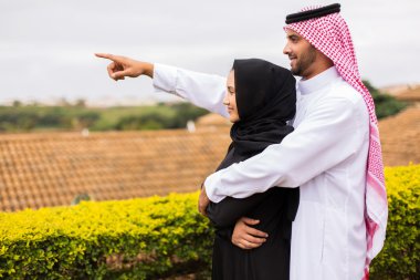 middle eastern couple pointing clipart
