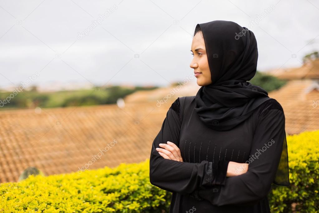 muslim woman with arms crossed