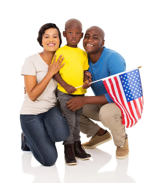 Africká americká rodina s usa vlajka — Stock fotografie