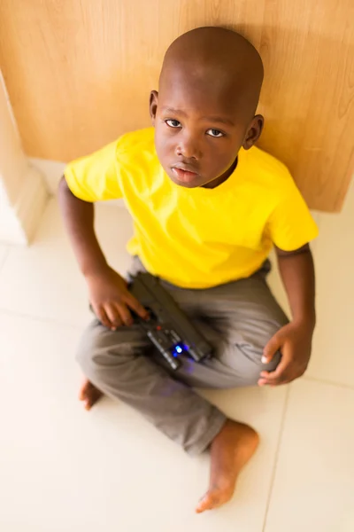 Boy playing with toy gun — Stock Photo, Image
