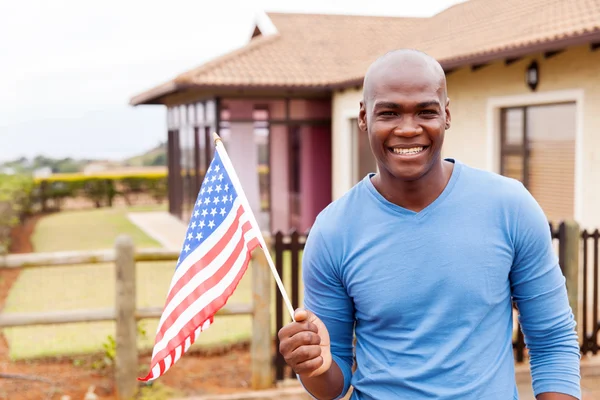 Человек с флагом США — стоковое фото