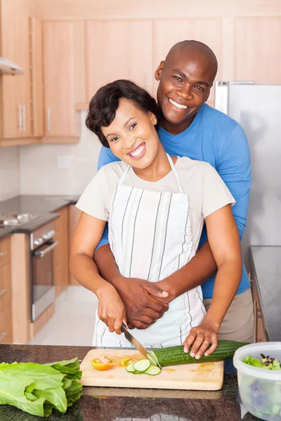 Couple cooking in kitchen — Stock Photo, Image