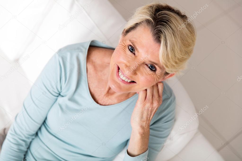 woman sitting on sofa