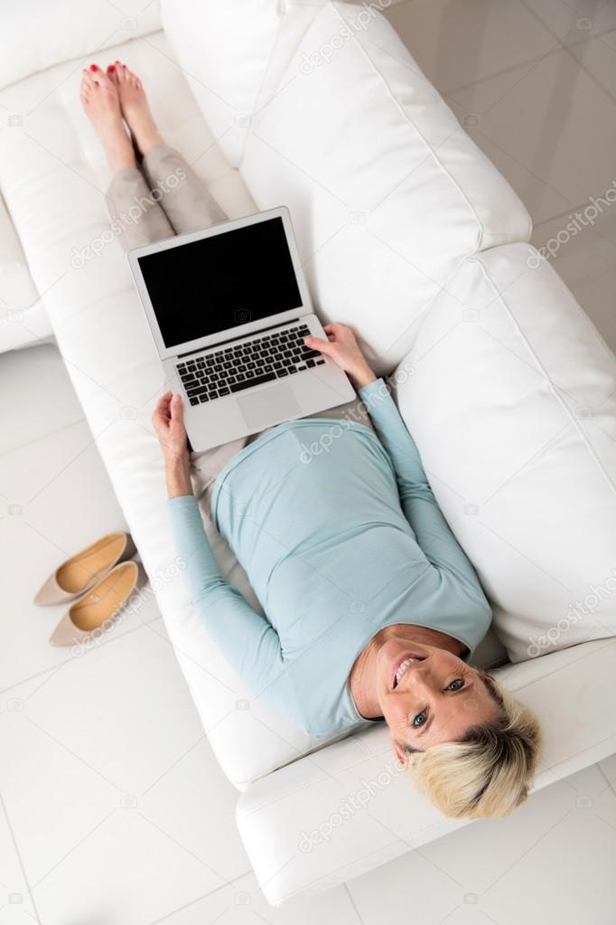 woman with laptop computer at home