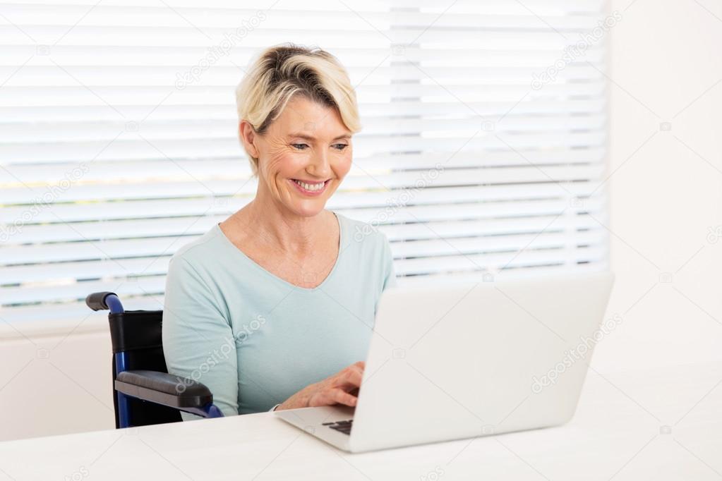 handicapped woman using laptop