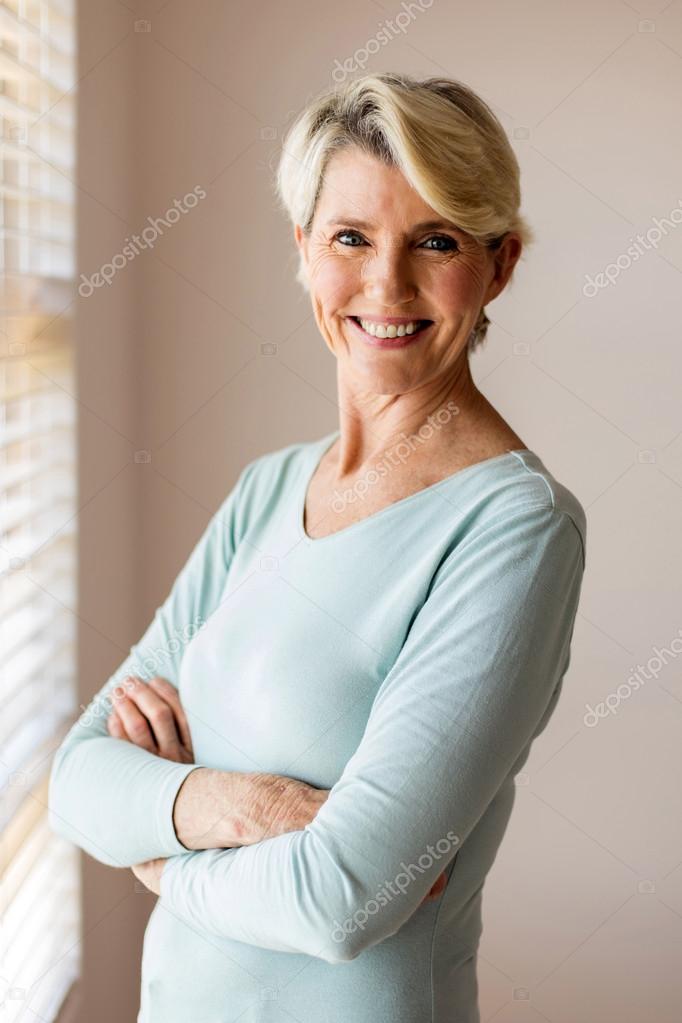 senior woman with arms folded