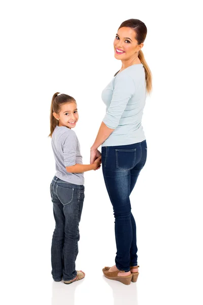 Jonge vrouw en klein meisje — Stockfoto