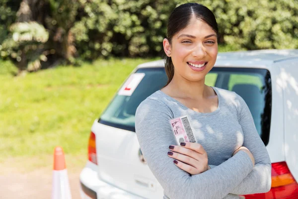 Woman showing driving license — Stock Photo, Image