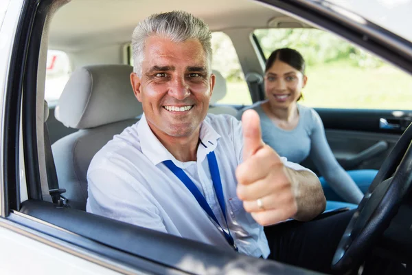 Instructor and student driver during lesson — Stock Photo, Image