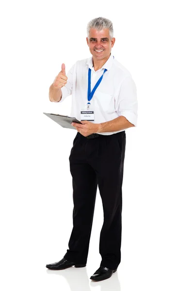 Driving instructor with clipboard — Stock Photo, Image