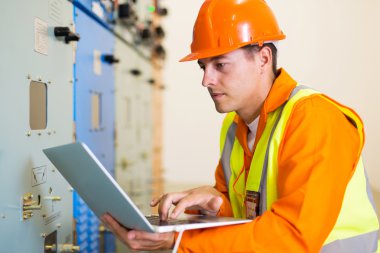 engineer using laptop computer clipart