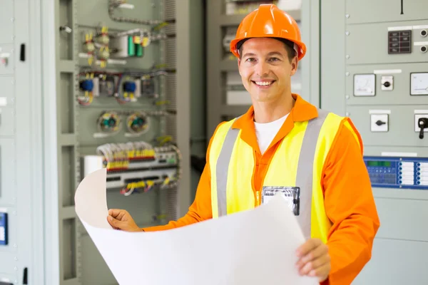 Ingeniero sosteniendo plano — Foto de Stock