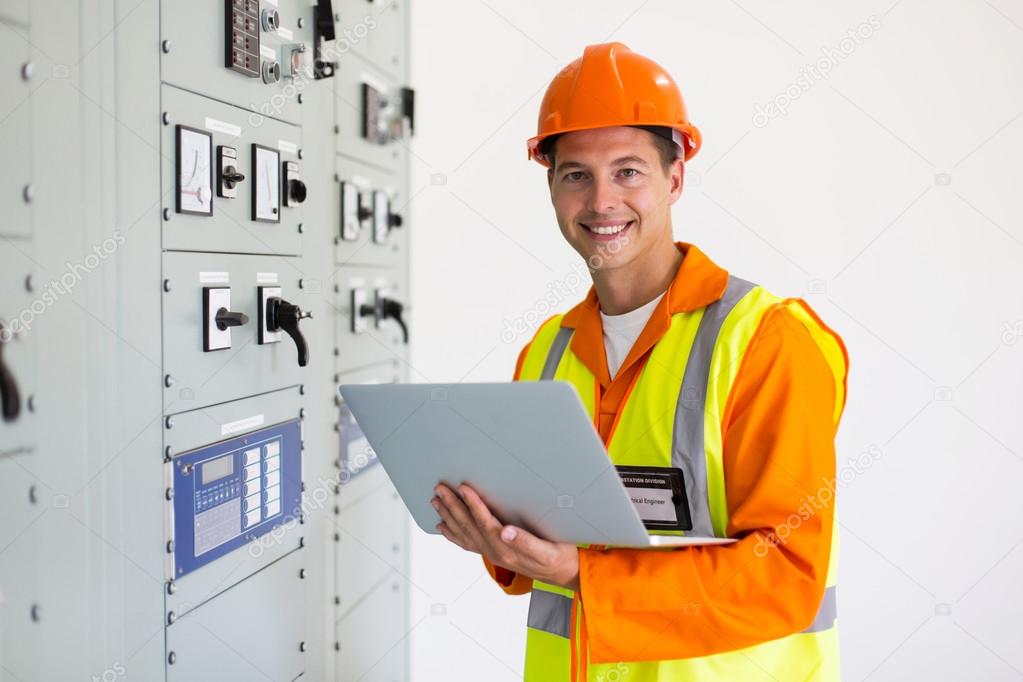 technical worker using laptop computer