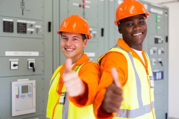 Technical co-workers with thumbs up — Stock Photo, Image