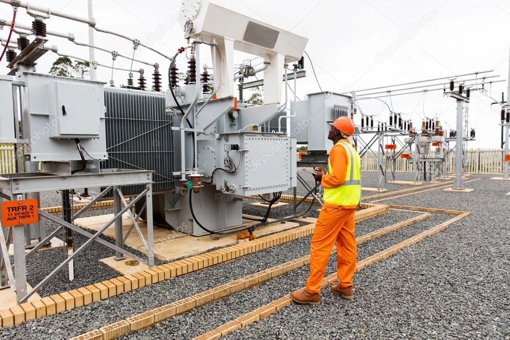 electrician working in electrical substation