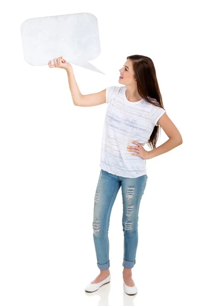 Chica sosteniendo el habla burbuja —  Fotos de Stock