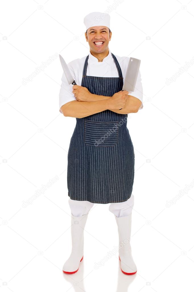 butcher holding knives