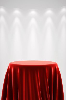 Kırmızı ipek ve spot ışığı ile yuvarlak Kaide