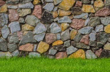 taş doku fotoğraf ile yeşil çim duvar
