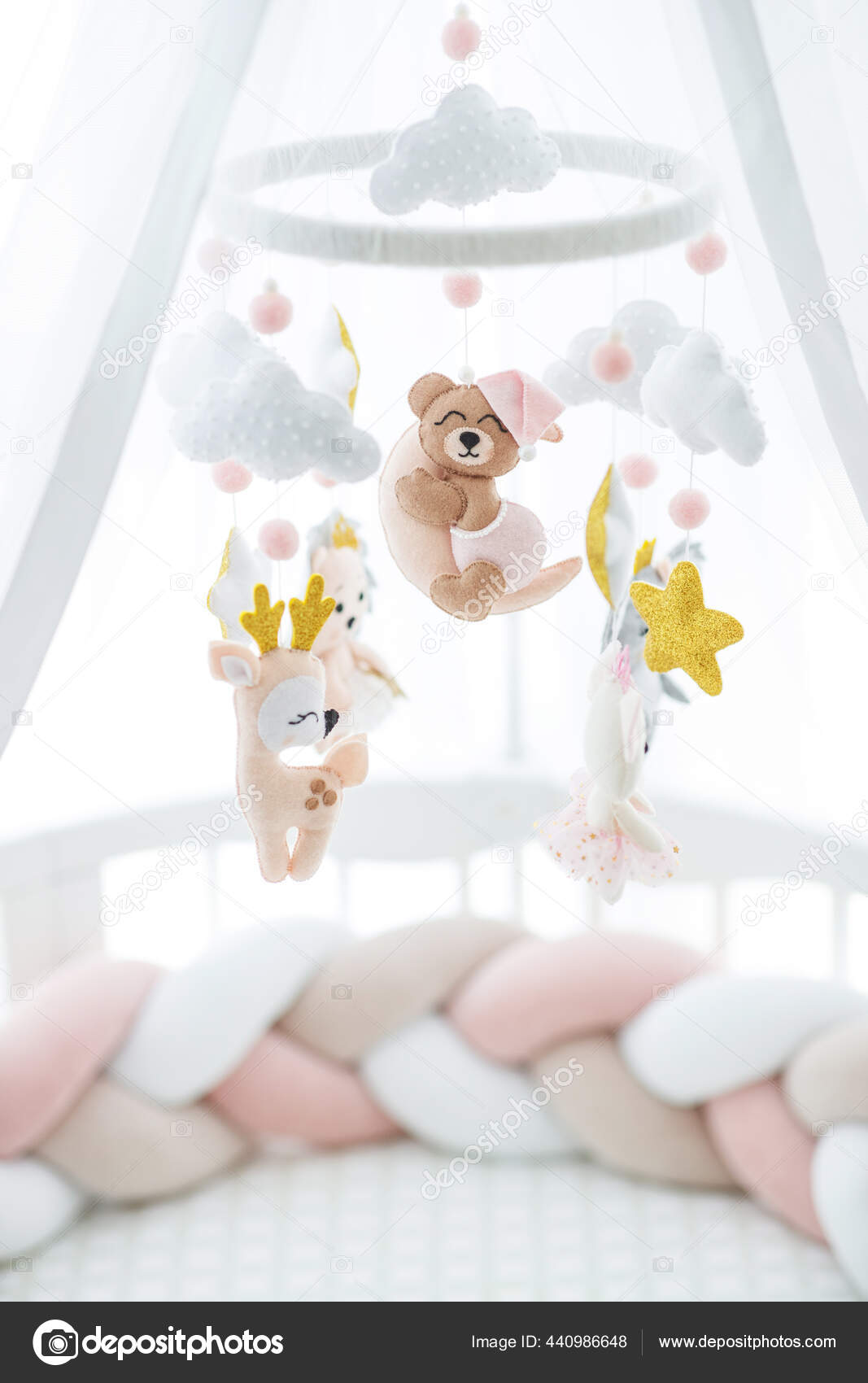 Toy that cheap hangs over crib