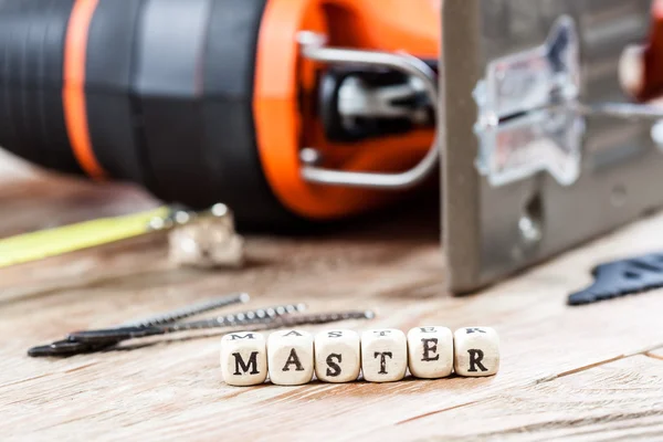 Wortmeister auf Holzklotz geschrieben. — Stockfoto