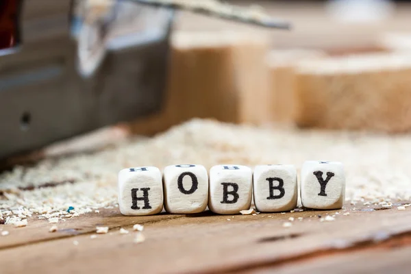Hobby ord skrivet på en träkloss. — Stockfoto