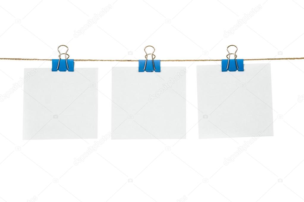 White paper cards hanging on a rope