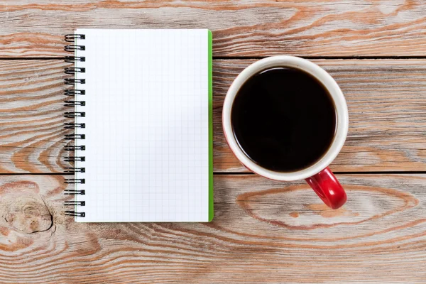 Tazza di caffè con taccuino — Foto Stock