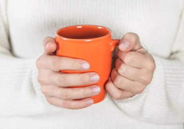 Cup of tea or coffee in female hands — Stock Photo, Image