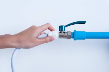 hand with pipe and valve