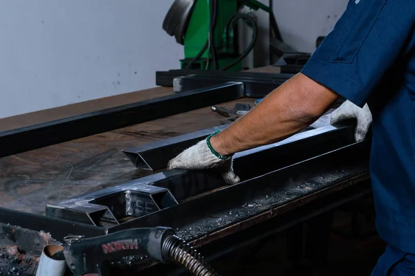 worker's hands on working table