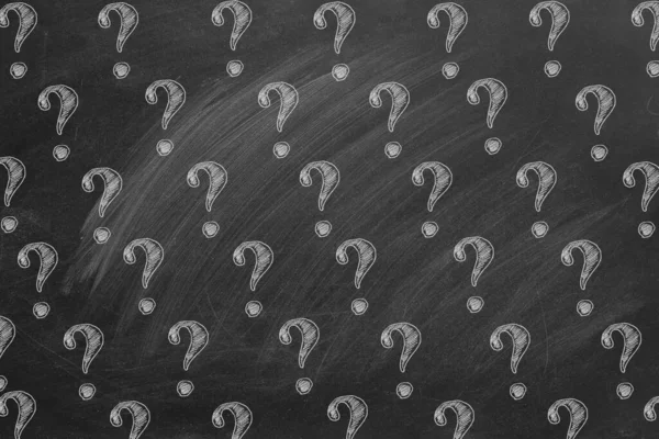 Question marks on blackboard — Stock Photo, Image