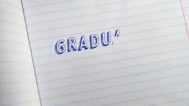 Graduación 2021. Letras en un cuaderno escolar — Vídeos de Stock