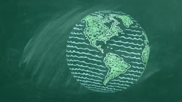 회전하는 지구가 학교 분필 보드 위에 있다 — 비디오