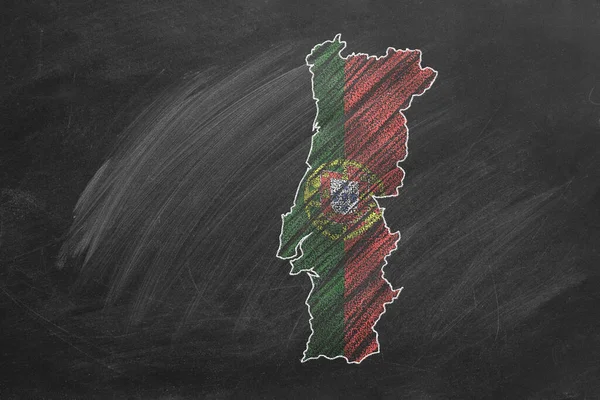 Country map and flag of Portugal drawing with chalk on a blackboard. One of a large series of maps and flags of different countries. Education, travel, study abroad concept.