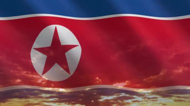 Kuzey Kore bayrağı canlı bir günbatımına doğru dalgalanıyor. Sıcak tonlarda vatansever ve ilham verici bir atmosfer yaratıyor..