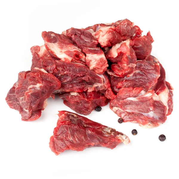 Brokken van ruwe rundvlees — Stockfoto