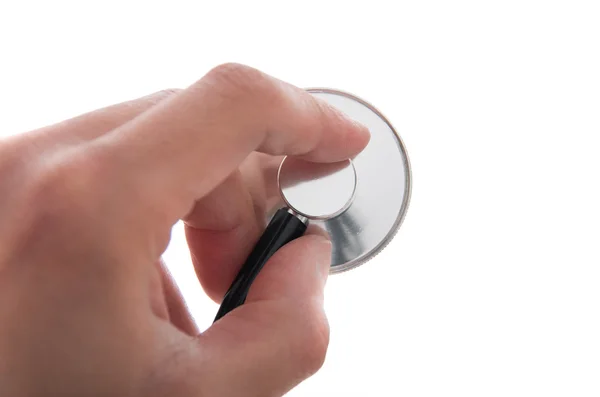 Hand of a physician holding a stethoscope — Stock Photo, Image