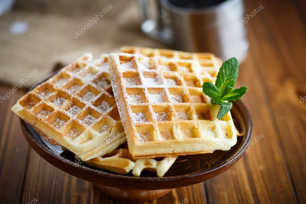 Viennese waffles with powdered sugar — Stock Photo © Rawlik 102194262