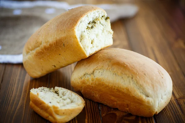 Bread stuffed with cheese and dill — Stock Photo, Image