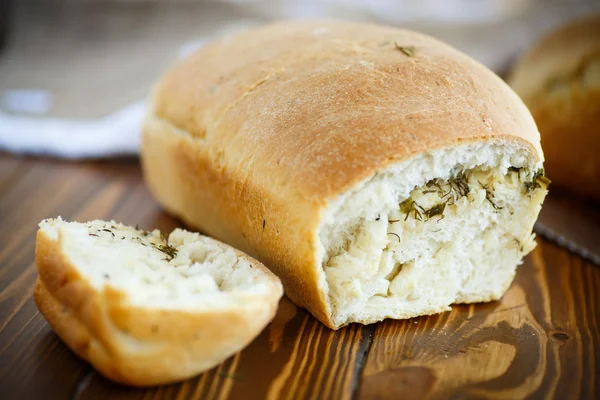 Bread stuffed with cheese and dill — Stock Photo, Image