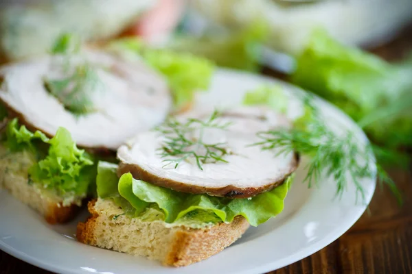 Sandwich with lettuce and bacon — Stock Photo, Image