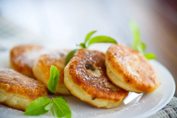 Sweet cheese pancakes on a plate — Stock Photo, Image