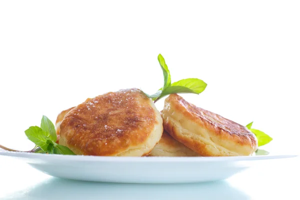 Sweet cheese pancakes on a plate — Stock Photo, Image