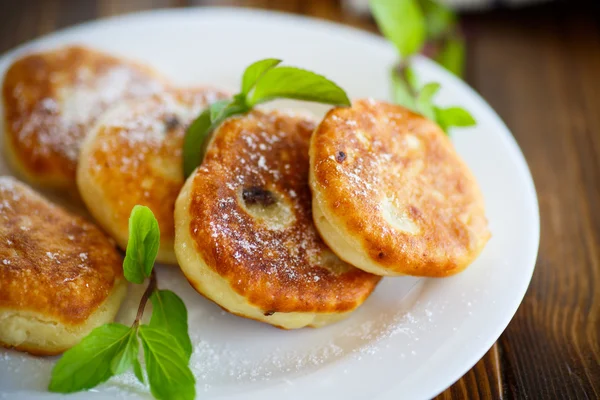 Sweet cheese pancakes on a plate — Stock Photo, Image