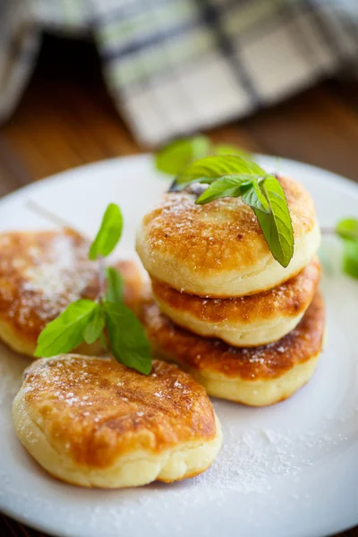 Sweet cheese pancakes on a plate — Stock Photo, Image