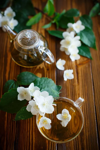 Jasmine tea in a glass pot — Stock Photo, Image