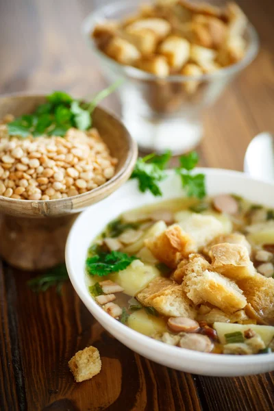 Pea soup with croutons — Stock Photo, Image