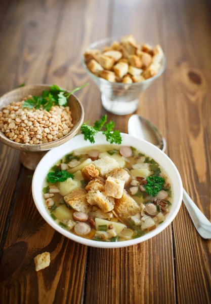 Pea soup with croutons — Stock Photo, Image